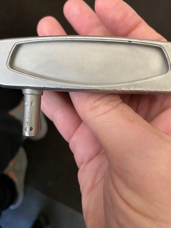 Putter head with the original face insert missing